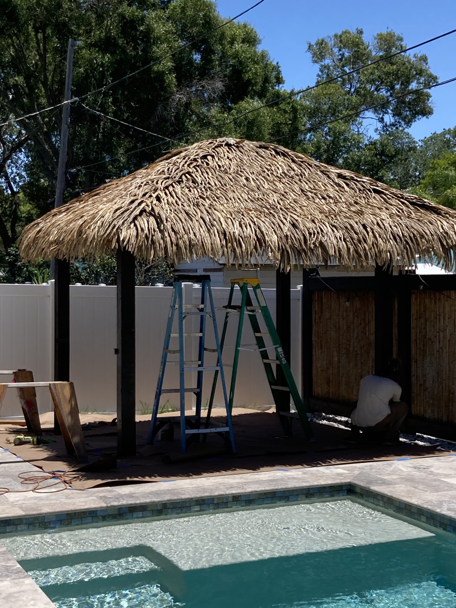 Tiki Hut with Palm Thatch Roof and Wood Posts