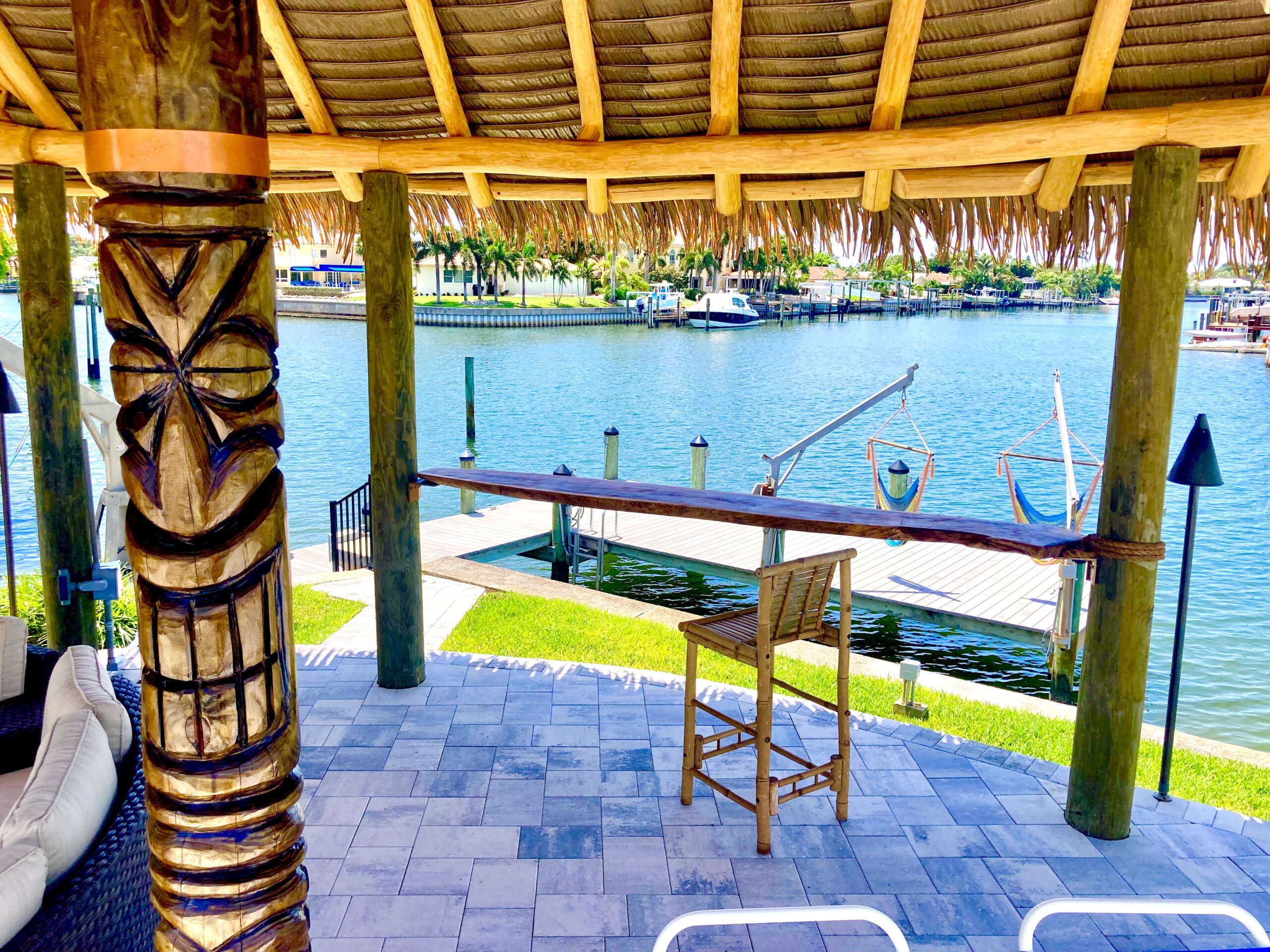 Waterfront Tiki Bar with Bamboo Counter & Palm Thatch