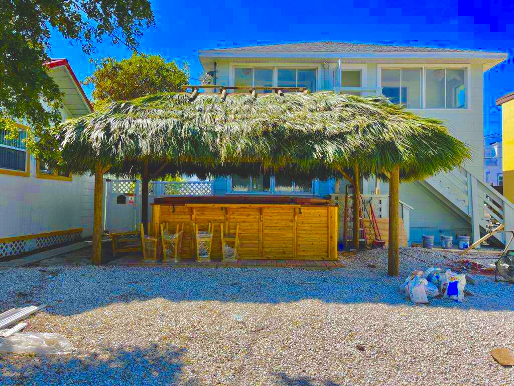 leaking or worn out Rethatch your hut with real palm $14 a sq ft. Convert to synthetic for $49